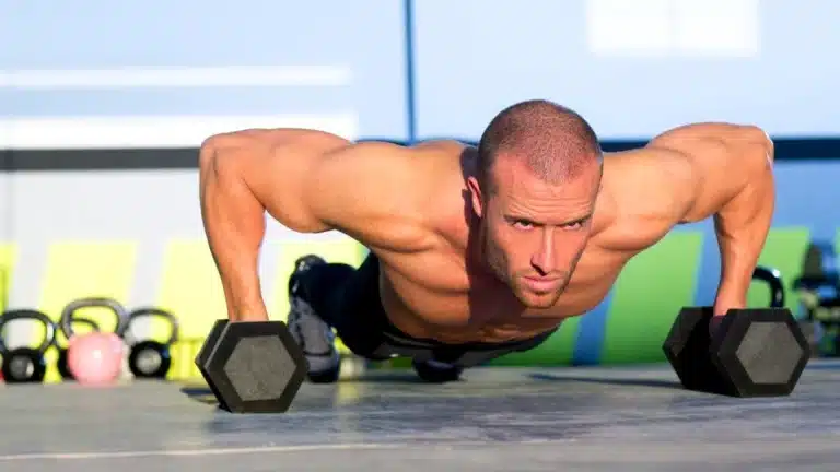 Wide grip dumbbell push ups